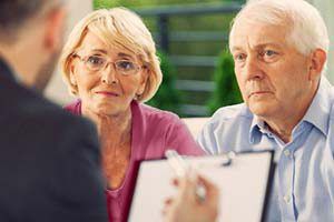Old Couple Consulting with Doctor About PAD Disease 