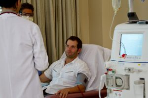 man on dialysis with nephrologist