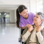 Nurse and Patient Smiling