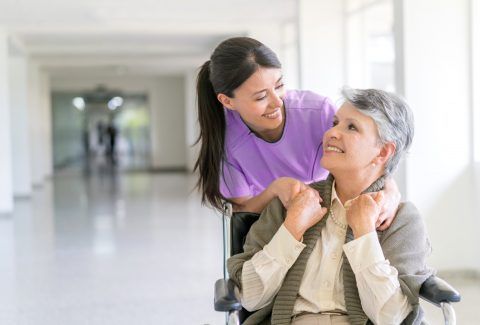 Nurse and Patient Smiling