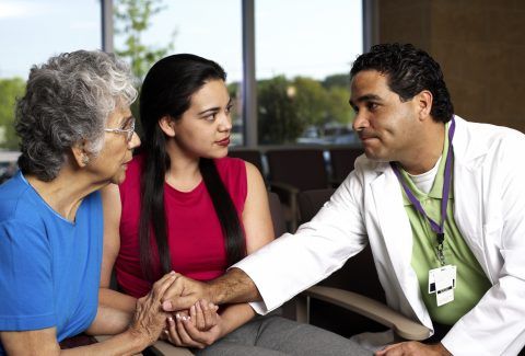 Physician Consoling Patients