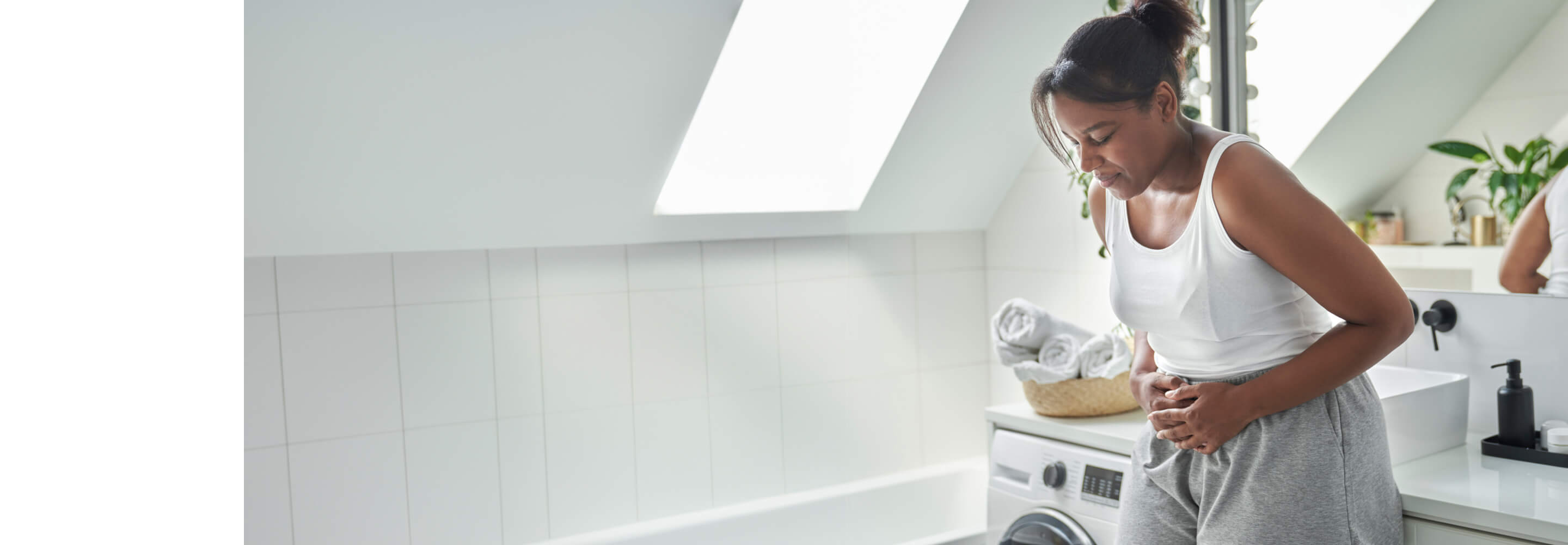 A woman in pain because of uterine fibroids