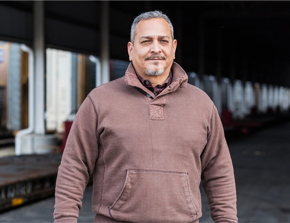 A man happy after a kyphoplasty or vertebroplasty procedure